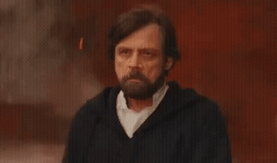 Bearded Man In Black Jacket Gesturing GIF