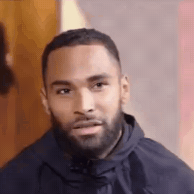 Bearded Man In Black Jacket Making Funny Face GIF