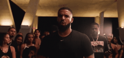 Bearded Man In Black Nike Shirt In Front Of Crowd GIF