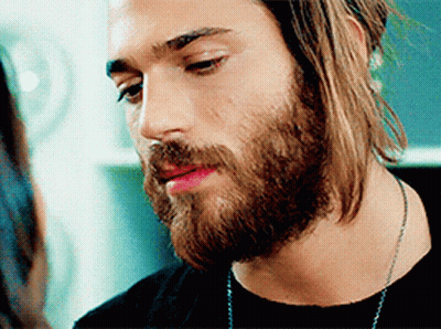 Bearded Man In Black Shirt And Necklace GIF