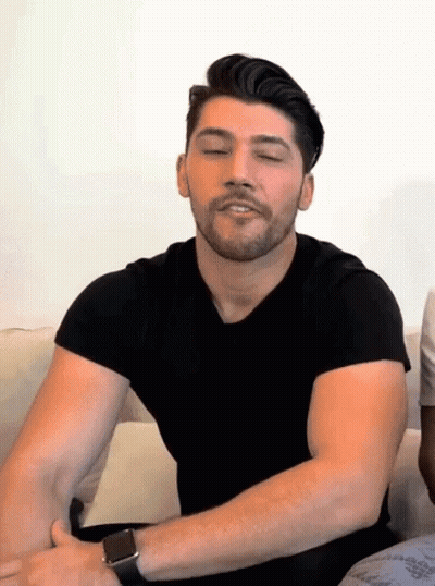 Bearded Man In Black Shirt And Watch GIF