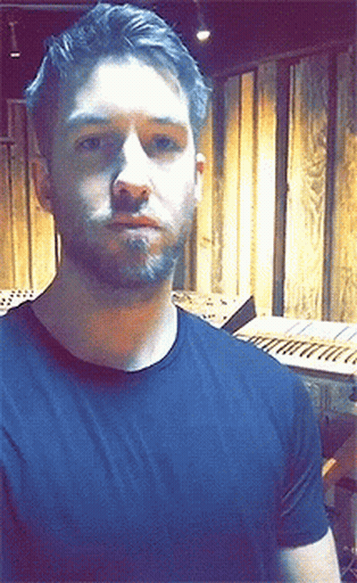 Bearded Man In Black Shirt At Keyboard GIF