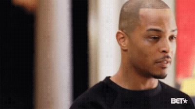 Bearded Man In Black Shirt Looking GIF