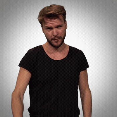 Bearded Man In Black Shirt Making Funny Face GIF