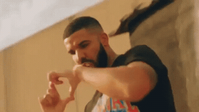 Bearded Man In Black Shirt Making Heart With Hands GIF