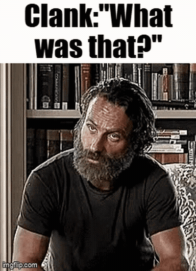Bearded Man In Black Shirt Sitting GIF