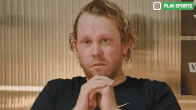Bearded Man In Black Shirt With Nike Logo GIF