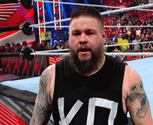 Bearded Man In Black Tank Top VD GIF