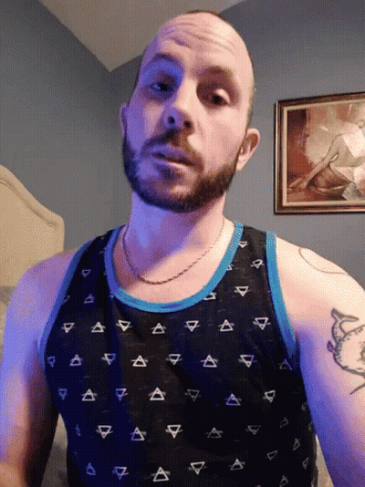 Bearded Man In Black Triangle Tank Top GIF