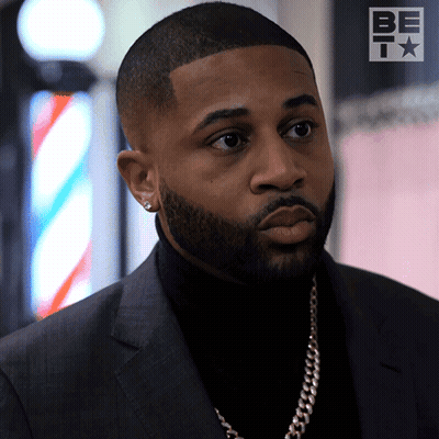 Bearded Man in Black Turtleneck and Suit