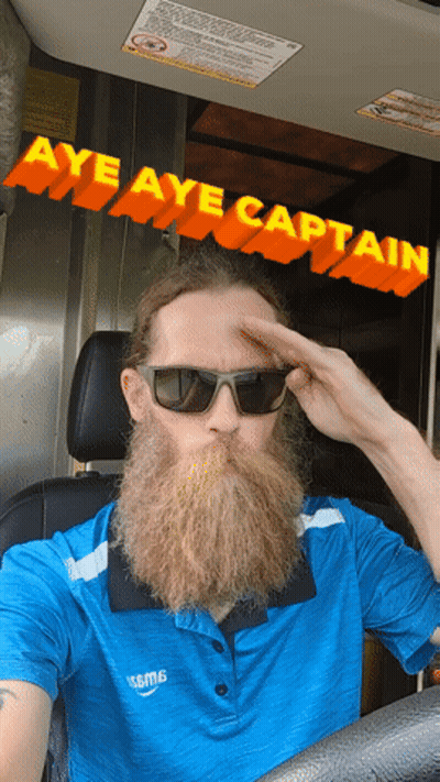 Bearded Man In Blue Amazon Shirt And Sunglasses GIF