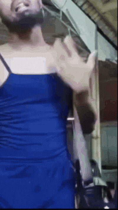 Bearded Man In Blue Dress And Tank Top GIF