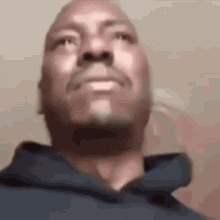 Bearded Man In Blue Hoodie Looking Up GIF