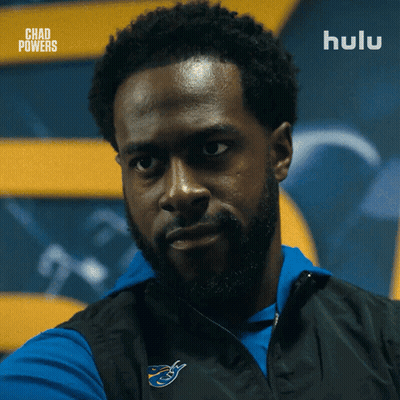 Bearded Man In Blue Shirt And Black Vest Saying Hulu GIF