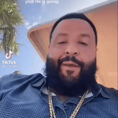 Bearded Man In Blue Shirt And Gold Chains GIF