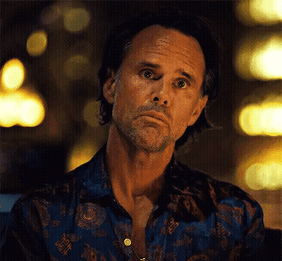 Bearded Man In Blue Shirt Making Face GIF