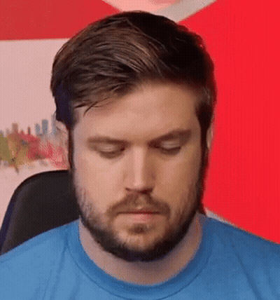 Bearded Man In Blue Shirt Making Funny Face GIF