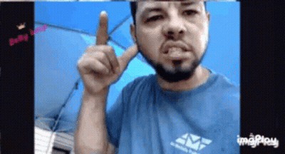 Bearded Man In Blue Shirt Pointing GIF