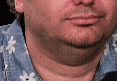 Bearded Man In Blue Shirt With White Flowers GIF