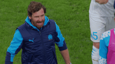 Bearded Man In Blue Vest With Letter M GIF