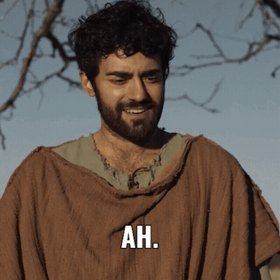 Bearded Man In Brown Robe Saying Ah GIF