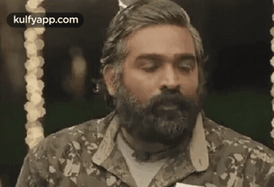 Bearded Man In Camo Shirt And Bow Tie GIF