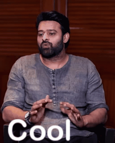 Bearded Man In Chair Saying Cool GIF