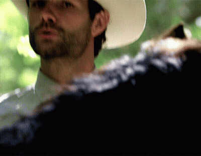 Bearded Man In Cowboy Hat Looking GIF