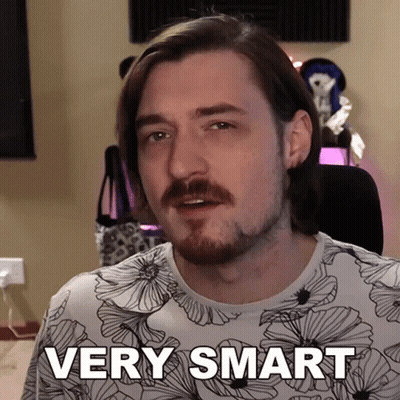 Bearded Man in Floral Shirt Saying Very Smart