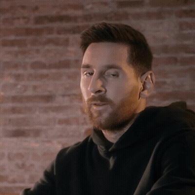 Bearded Man In Front Of Brick Wall GIF