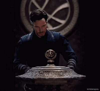 Bearded Man In Front Of Clock Looking GIF