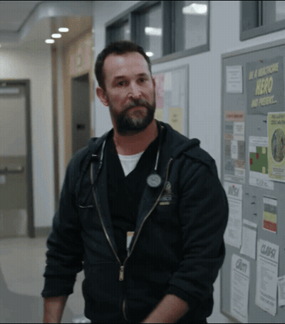 Bearded Man In Front Of Hero And Present Bulletin Board GIF