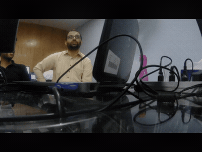 Bearded Man In Front Of HP Monitor GIF