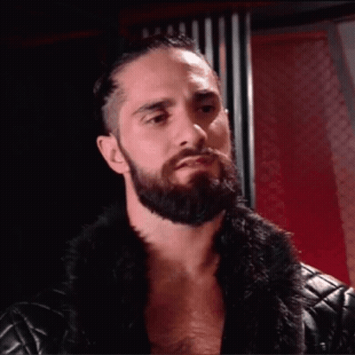 Bearded Man In Fur Coat And Leather Jacket GIF