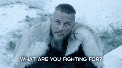 Bearded Man in Fur Coat Asking What Are You Fighting For