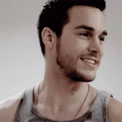 Bearded Man In Gray Tank Top Smiling GIF