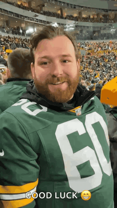 Bearded Man In Green Bay Packers Jersey At Stadium GIF