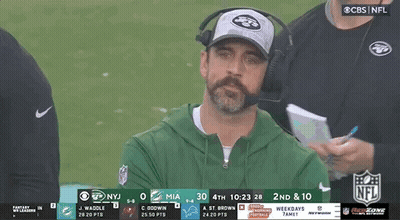 Bearded Man In Hat And Headphones Watching Football On CBS GIF