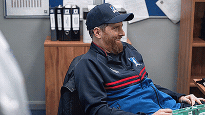 Bearded Man In Hat And Jacket Saying TSC GIF
