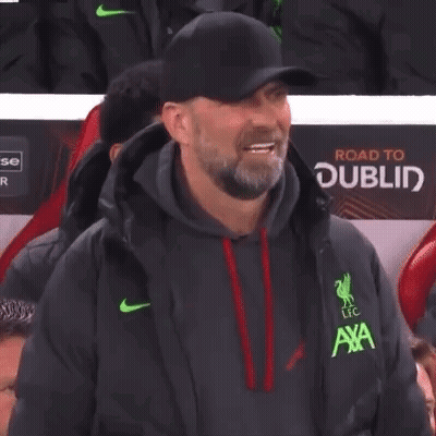 Bearded Man In Hat And Jacket Sitting In Stadium GIF