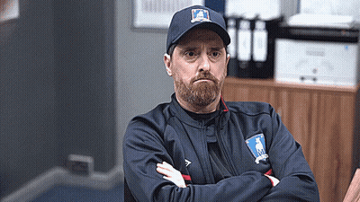 Bearded Man In Hat And Jacket With Arms Crossed GIF