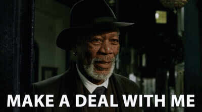 Bearded Man In Hat And Suit Saying Make A Deal With Me GIF