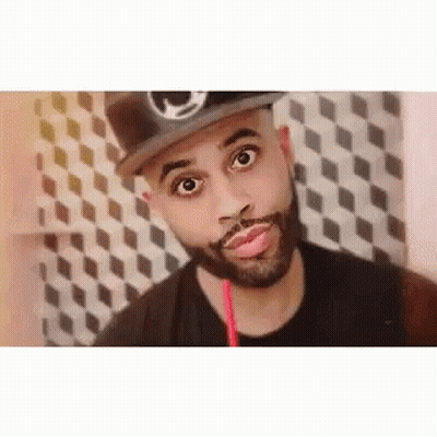 Bearded Man In Hat Drinking From Straw GIF