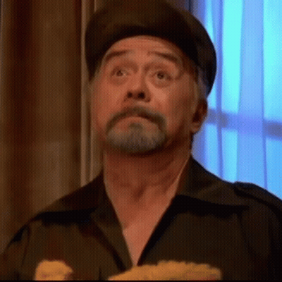 Bearded Man In Hat Holding Stuffed Animal GIF