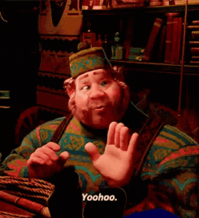 Bearded Man In Hat Raising Hand Saying Yoohoo GIF