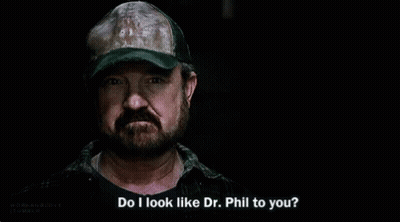 Bearded Man In Hat Talking To Another GIF