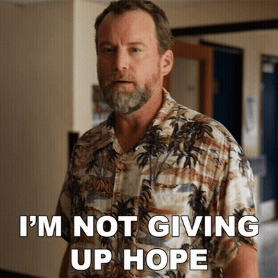 Bearded Man In Hawaiian Shirt Says I'm Not Giving Up Hope GIF
