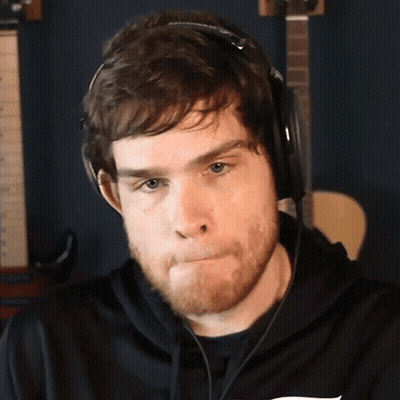 Bearded Man In Headphones And Black Hoodie GIF
