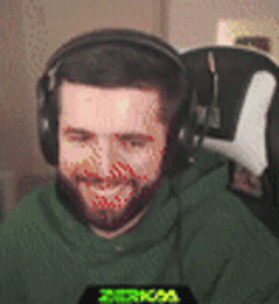 Bearded Man In Headphones And Green Hoodie Smiling GIF