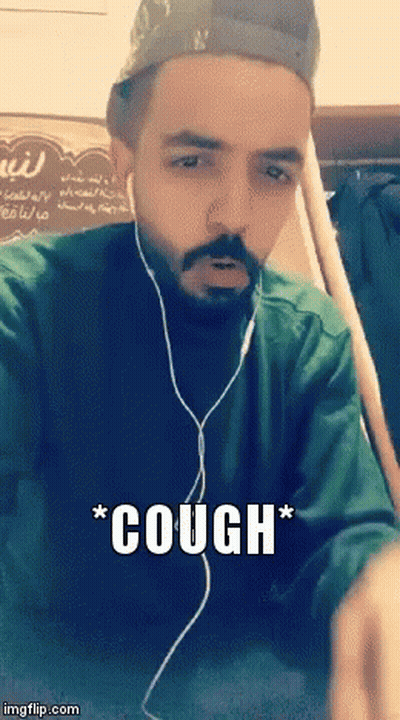 Bearded Man In Headphones And Hat Coughs GIF